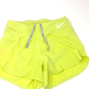 Nike, women’s school, Dri-fit running shorts, in lemon/lime color